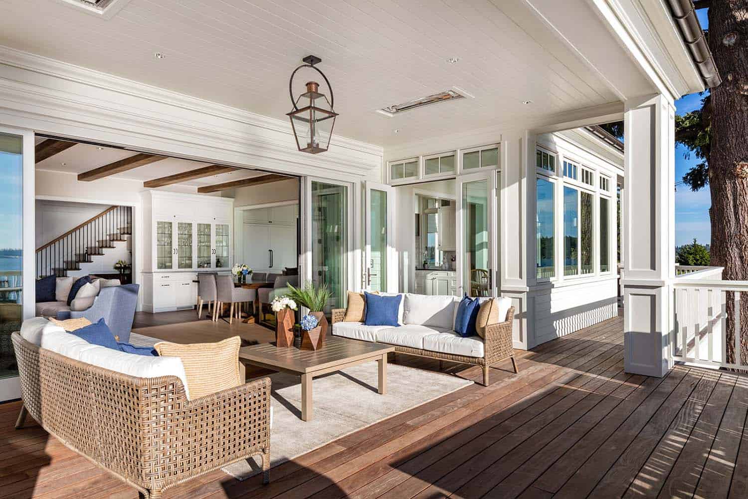 contemporary covered deck with outdoor furniture