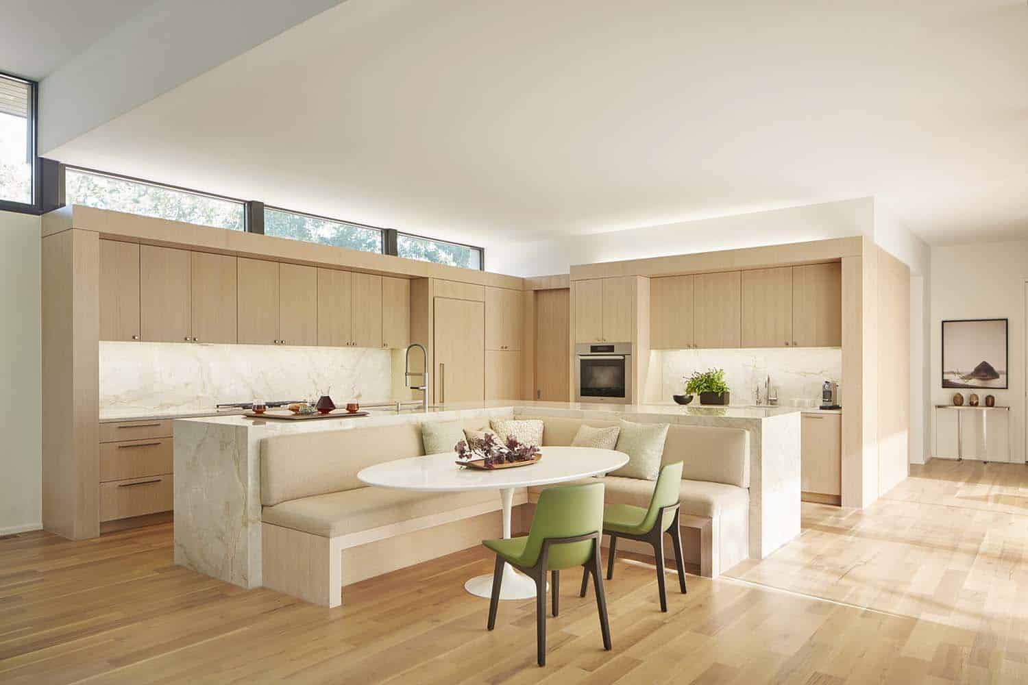 modern kitchen with a built-in dining banquette