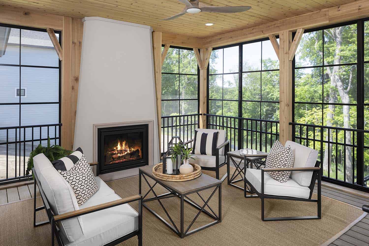 modern screened porch with a fireplace