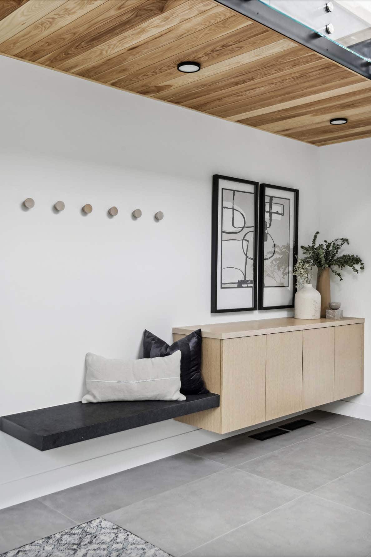 modern house entry with a built-in console and bench