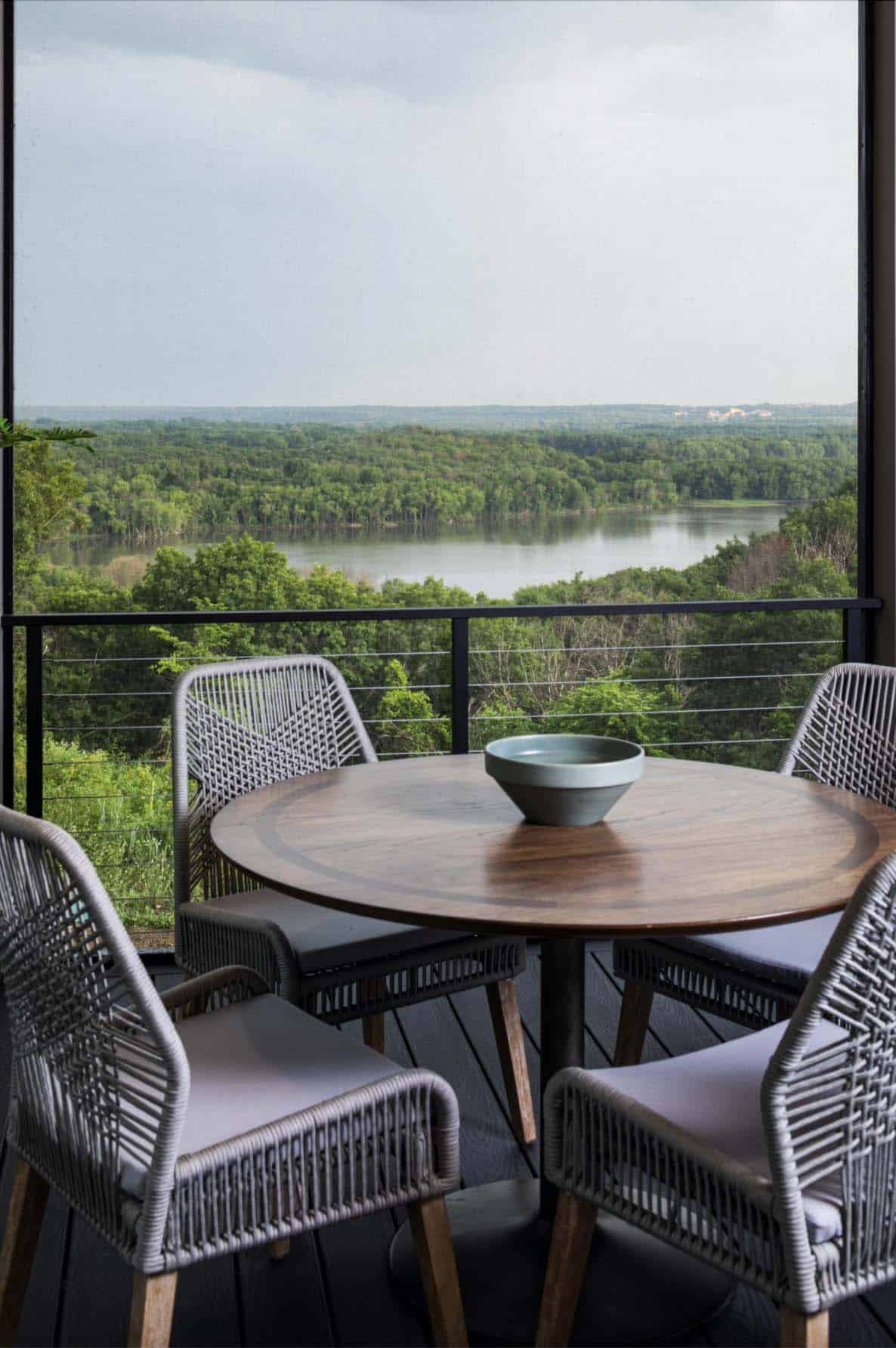 modern patio with outdoor dining overlooking the Mississippi River