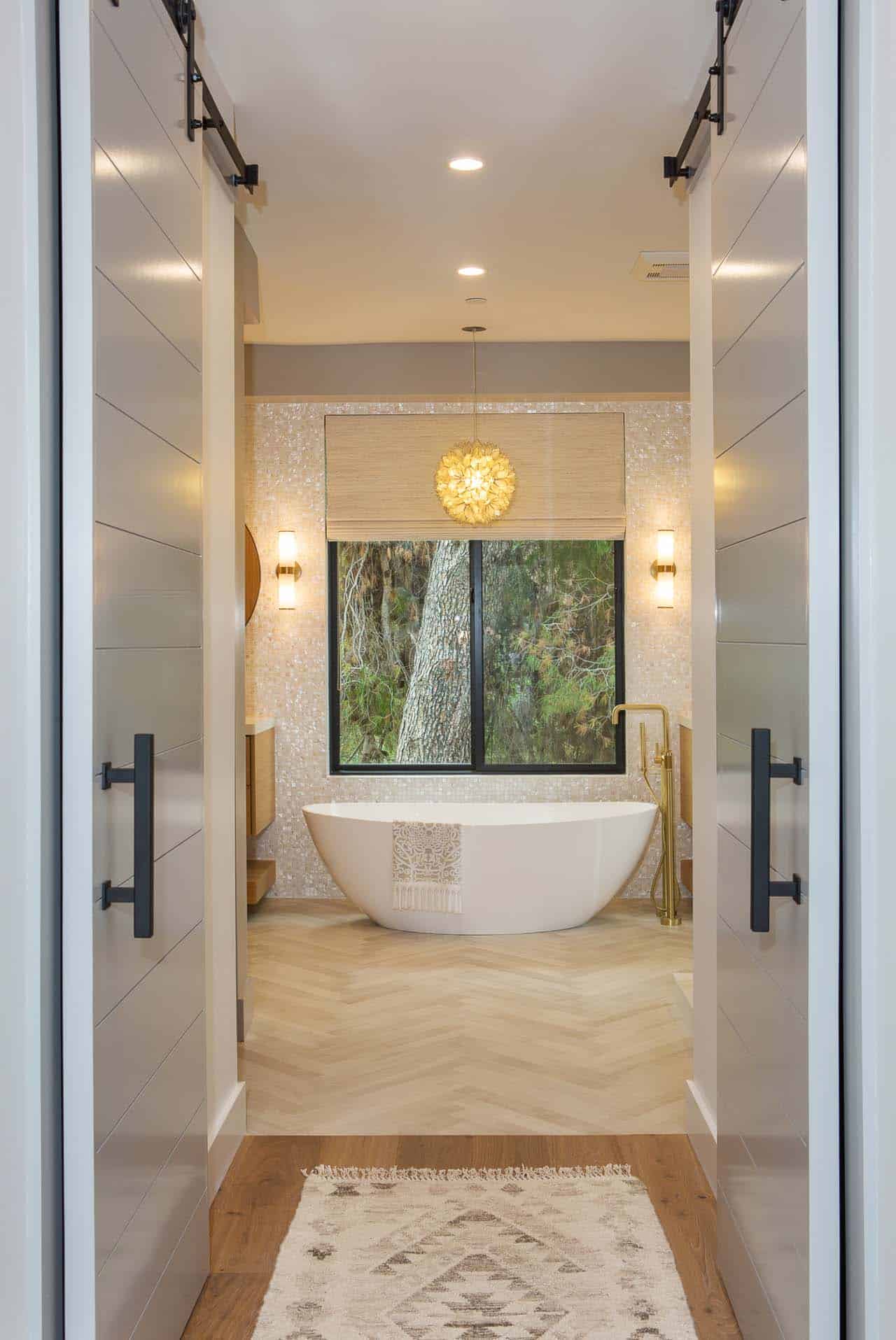 view into the bath to see the freestanding tub from the bedroom
