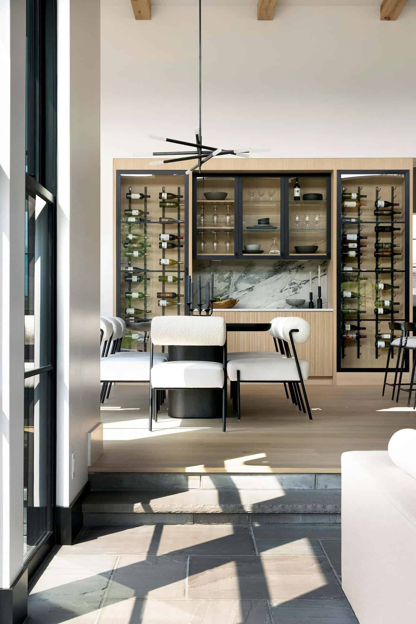 modern dining room with a wine display