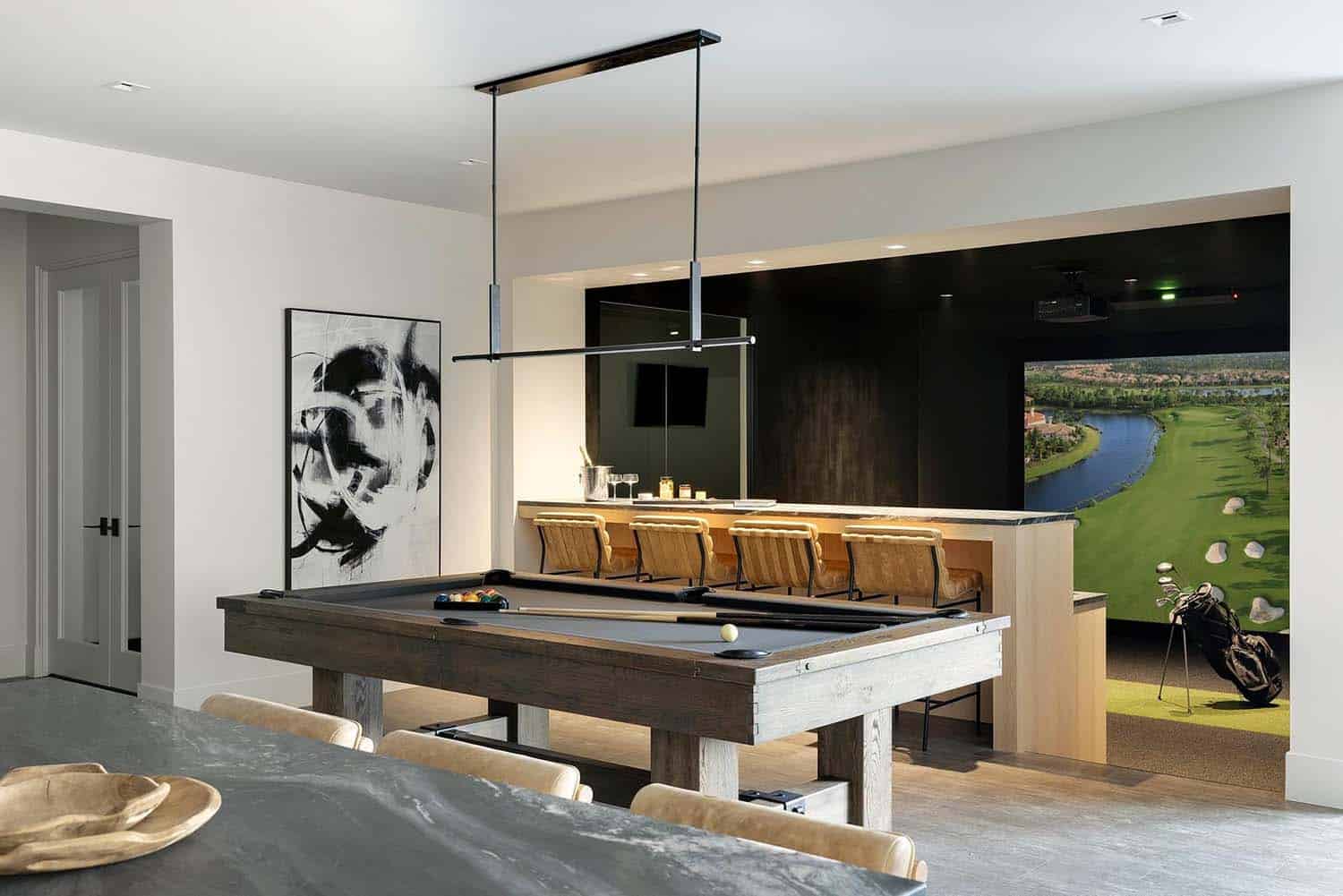 modern pool table and golf simulator room
