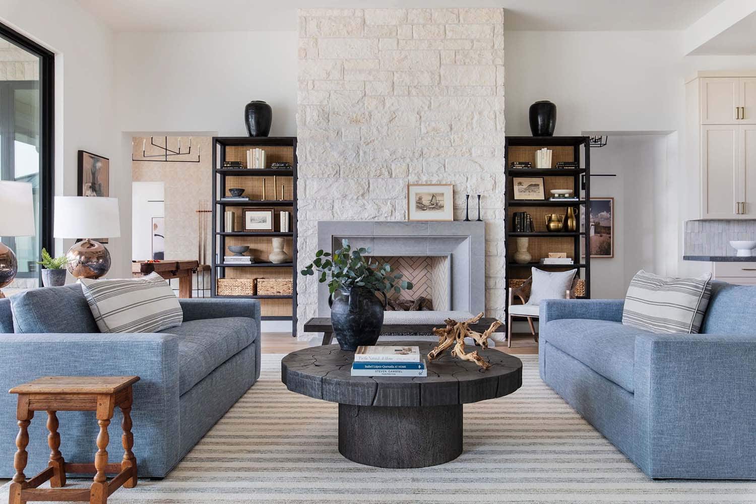 modern ranch style living room with a fireplace