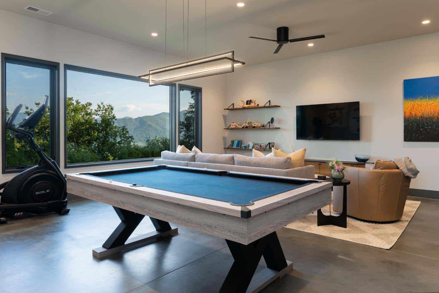 modern family room with a pool table