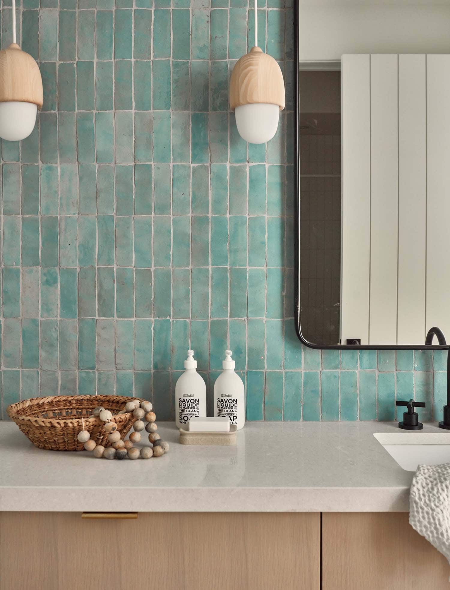 nordic-inspired bathroom with blue tile
