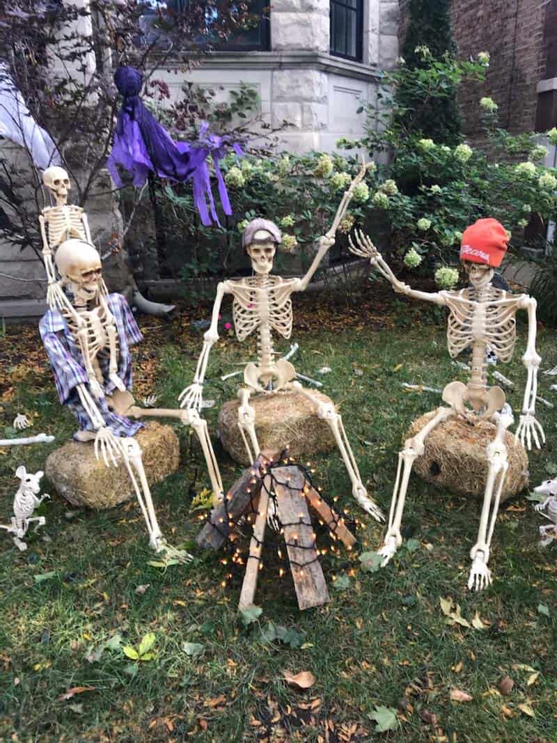 skeletons around a fire pit