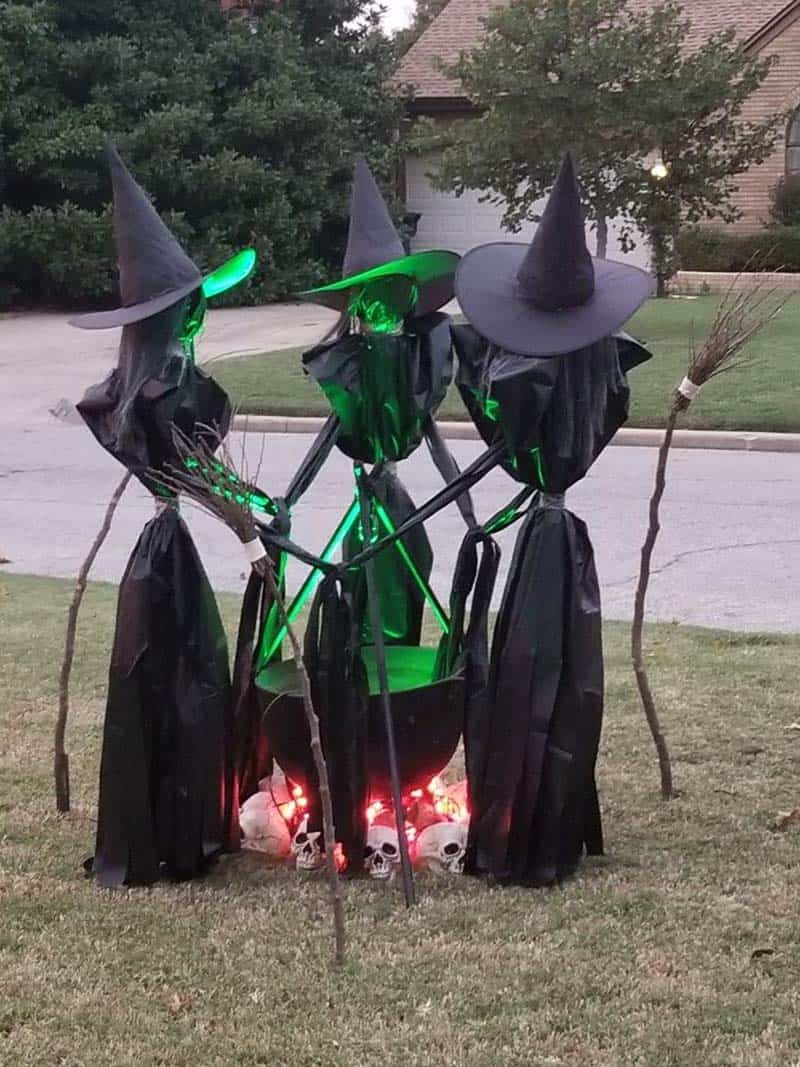 witches cauldron on the front yard for Halloween decorations