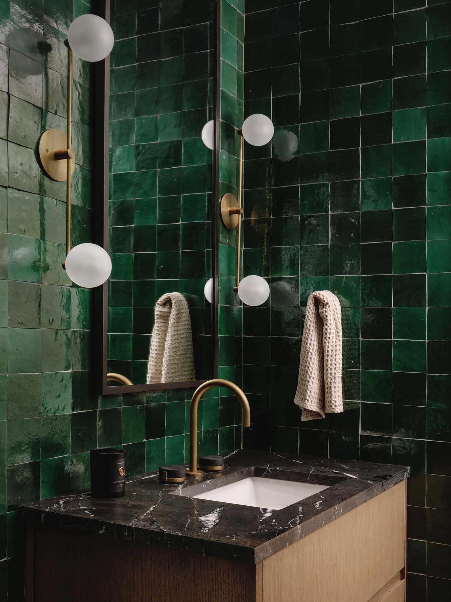 transitional style power room with green tile