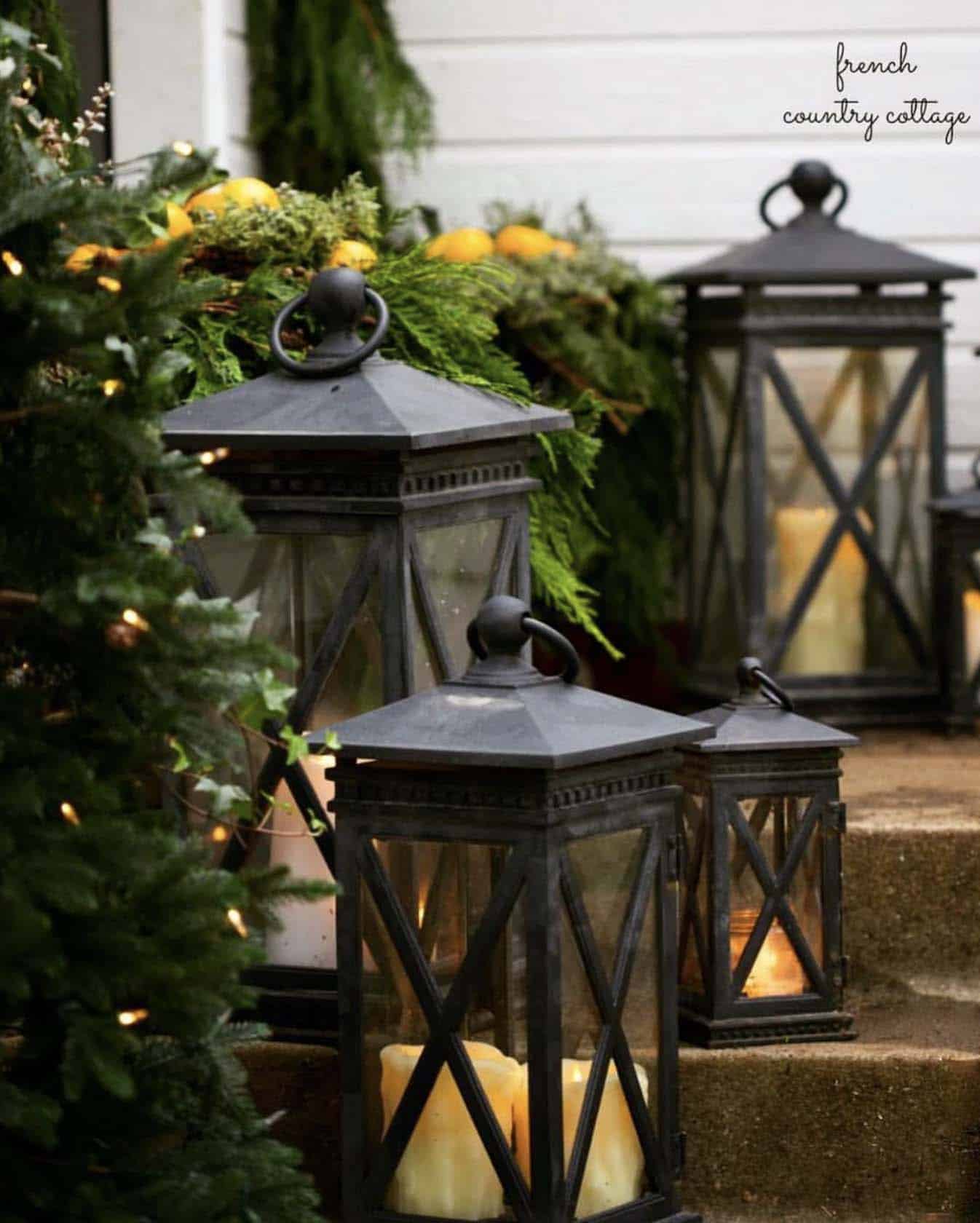 Christmas lanterns on the front porch steps