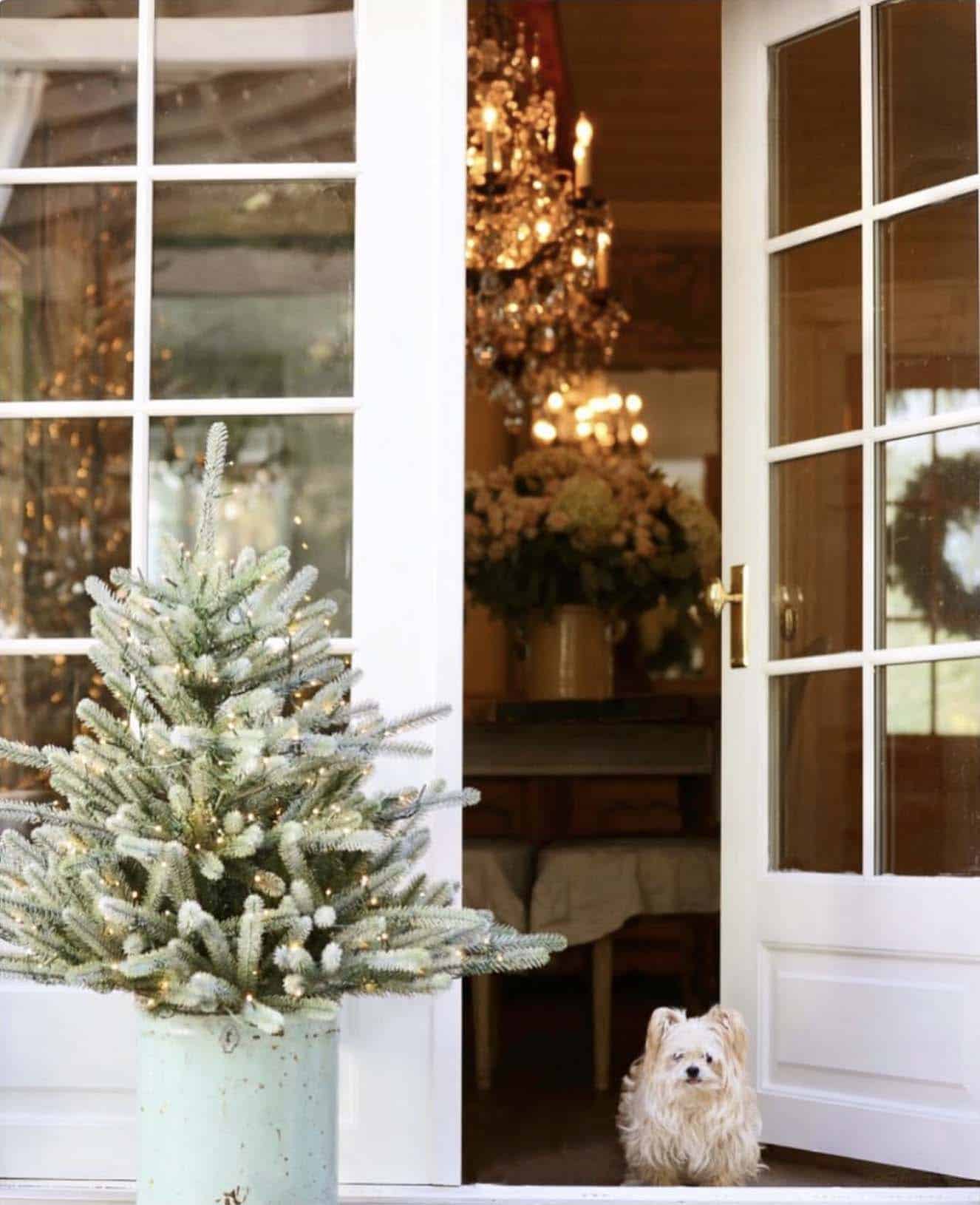 entryway with French doors accented with a small Christmas tree