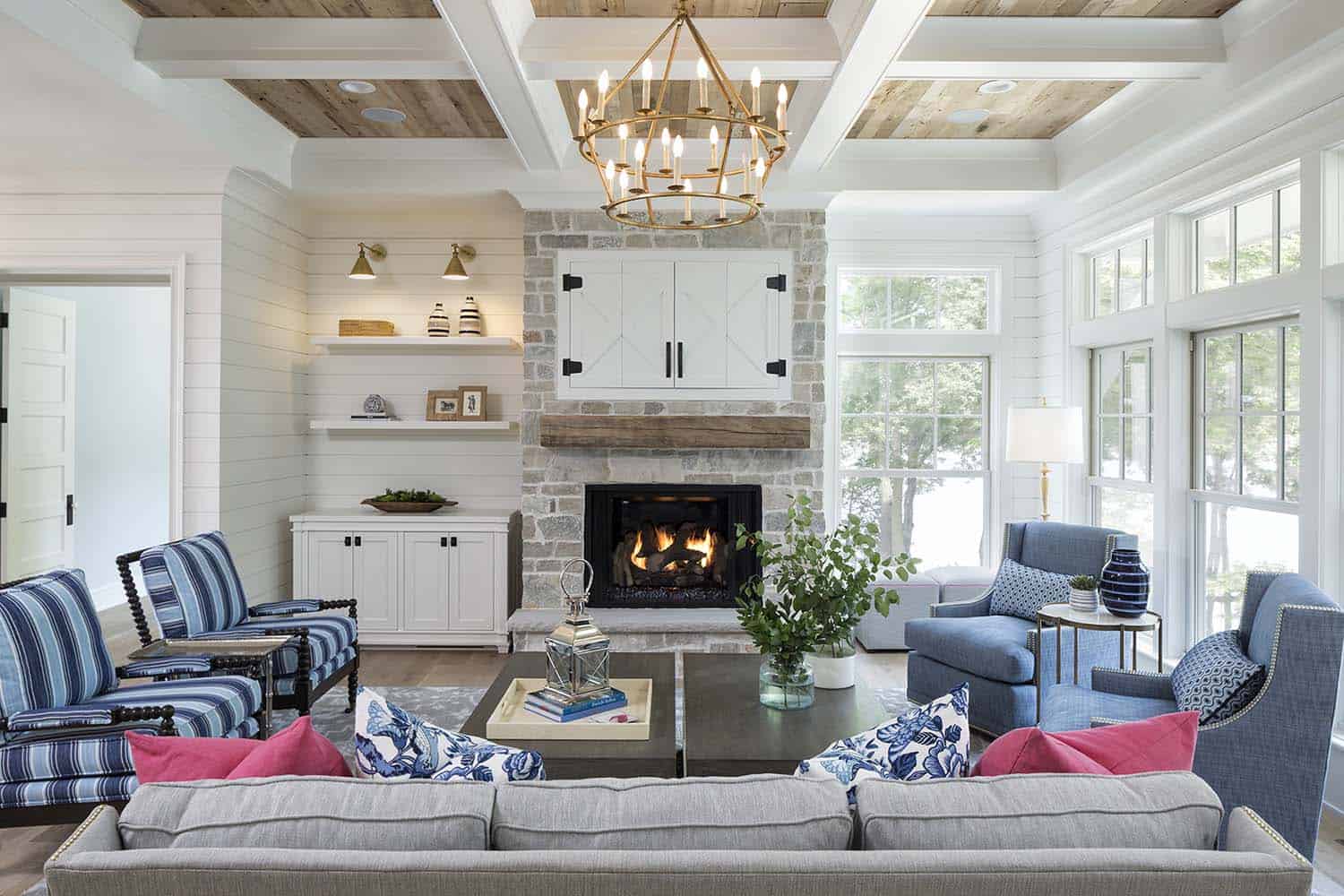 coastal farmhouse style living room with a fireplace 