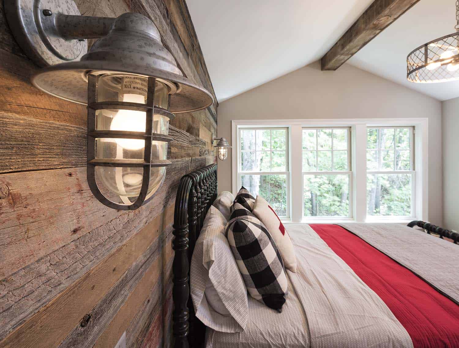 coastal farmhouse style bedroom with a wood accent wall