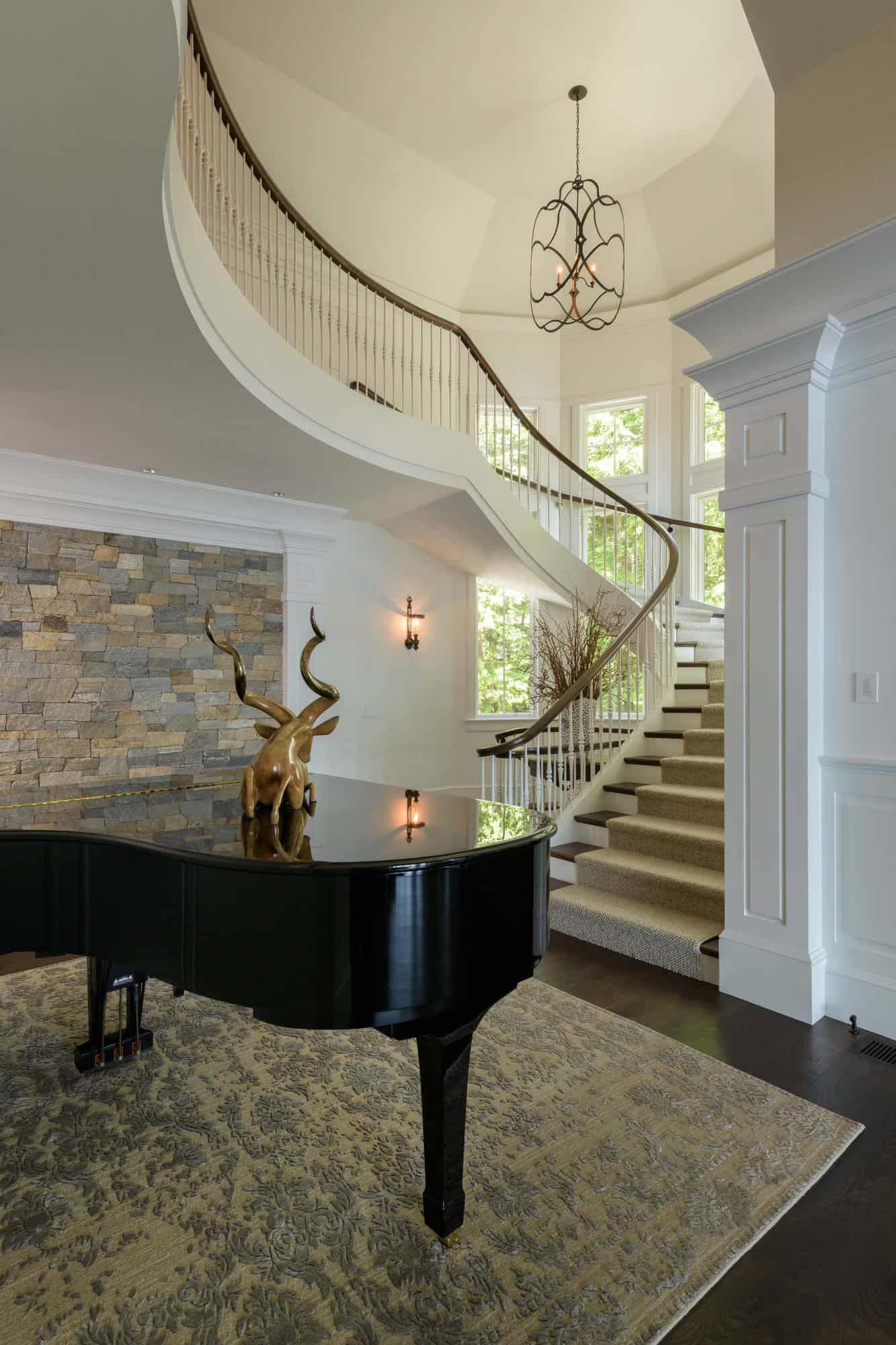 contemporary hallway with a piano and a staircase