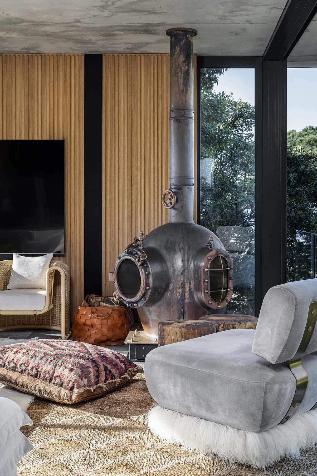 contemporary living room with a fireplace inspired by a 1920s copper diving helmet