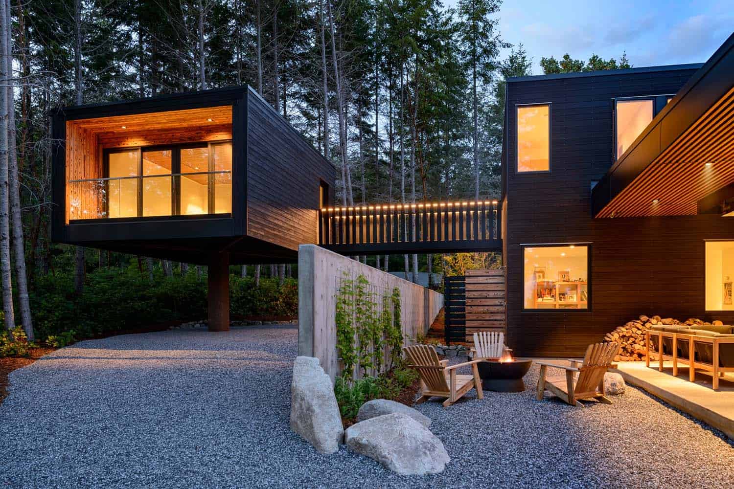 contemporary waterfront house exterior at dusk