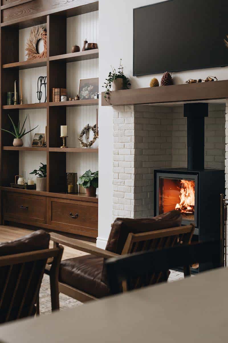 modern living room with a stove fireplace