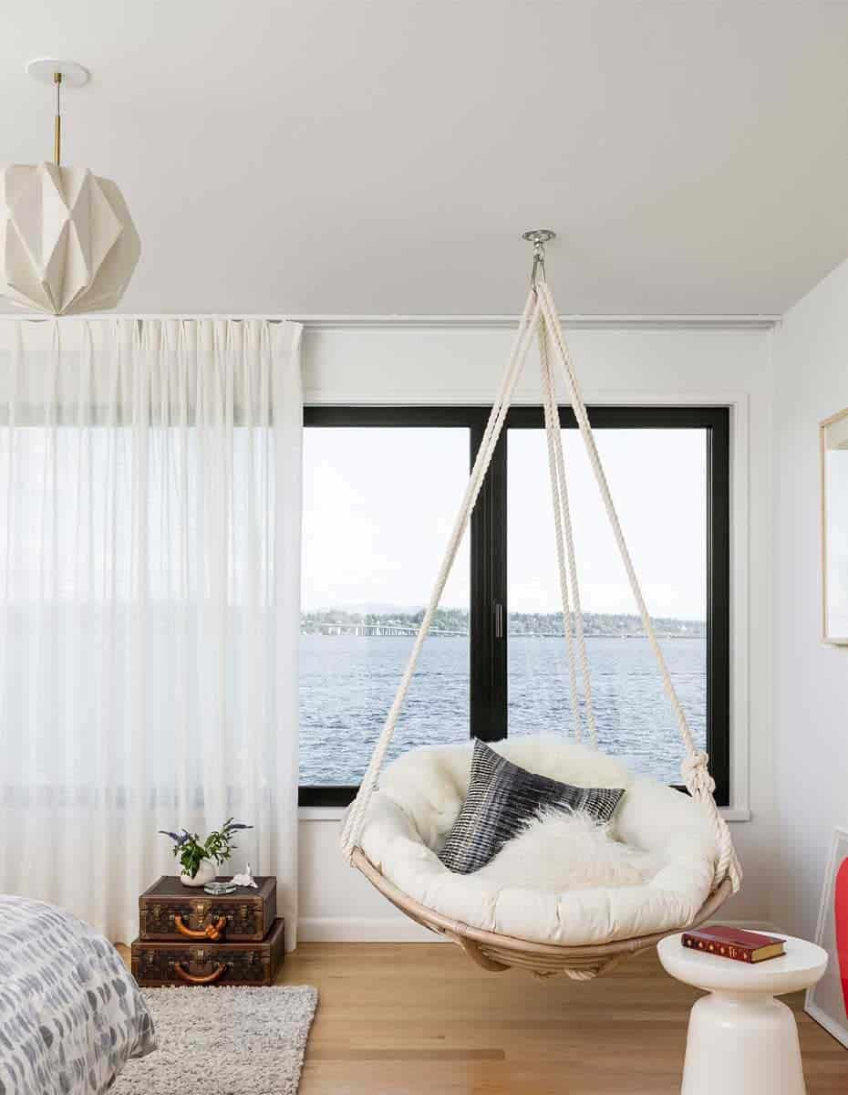 modern bedroom with a hanging chair