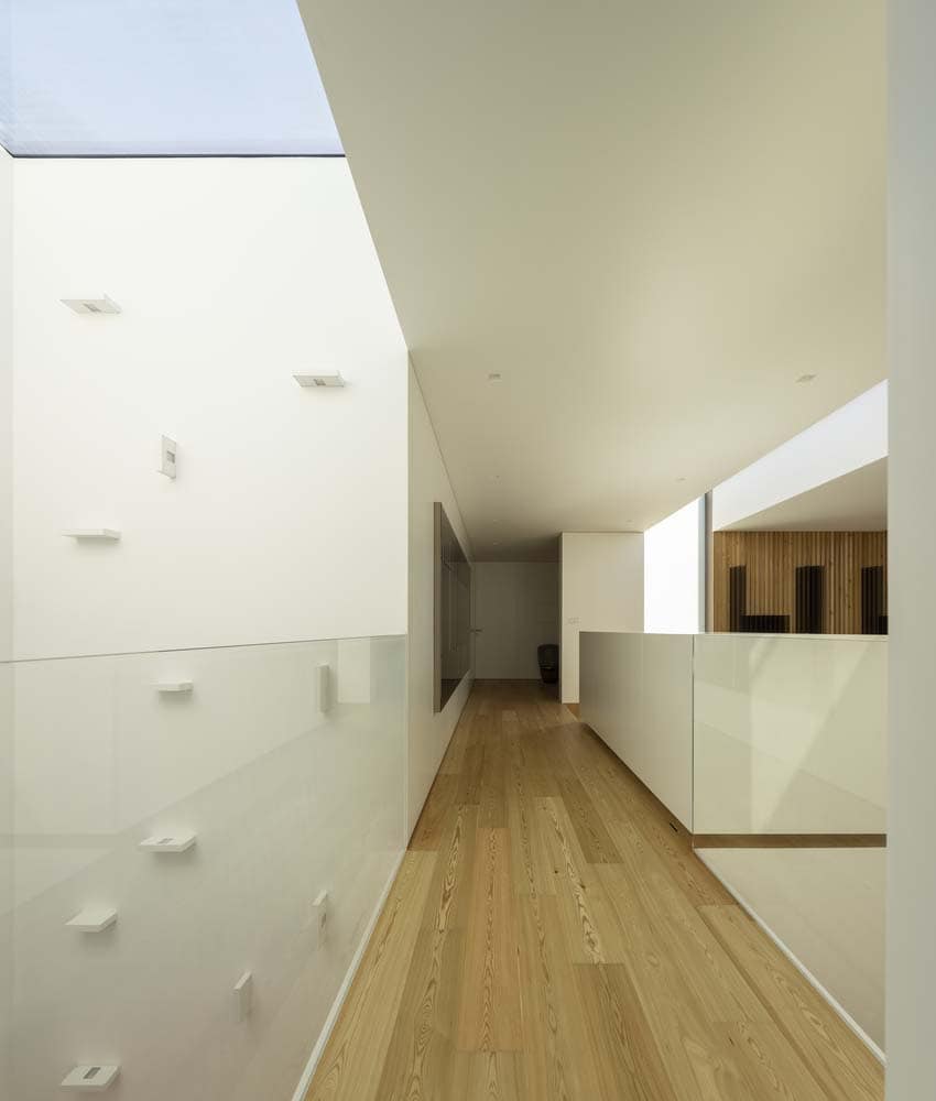 modern hallway with a wall of glass