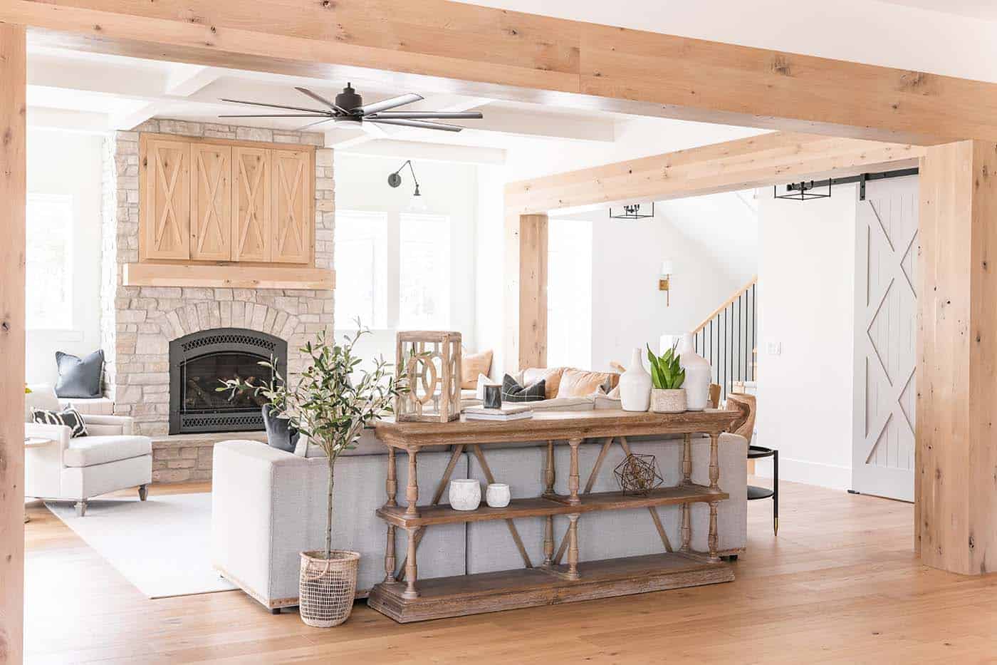 modern farmhouse living room with wood ceiling beams
