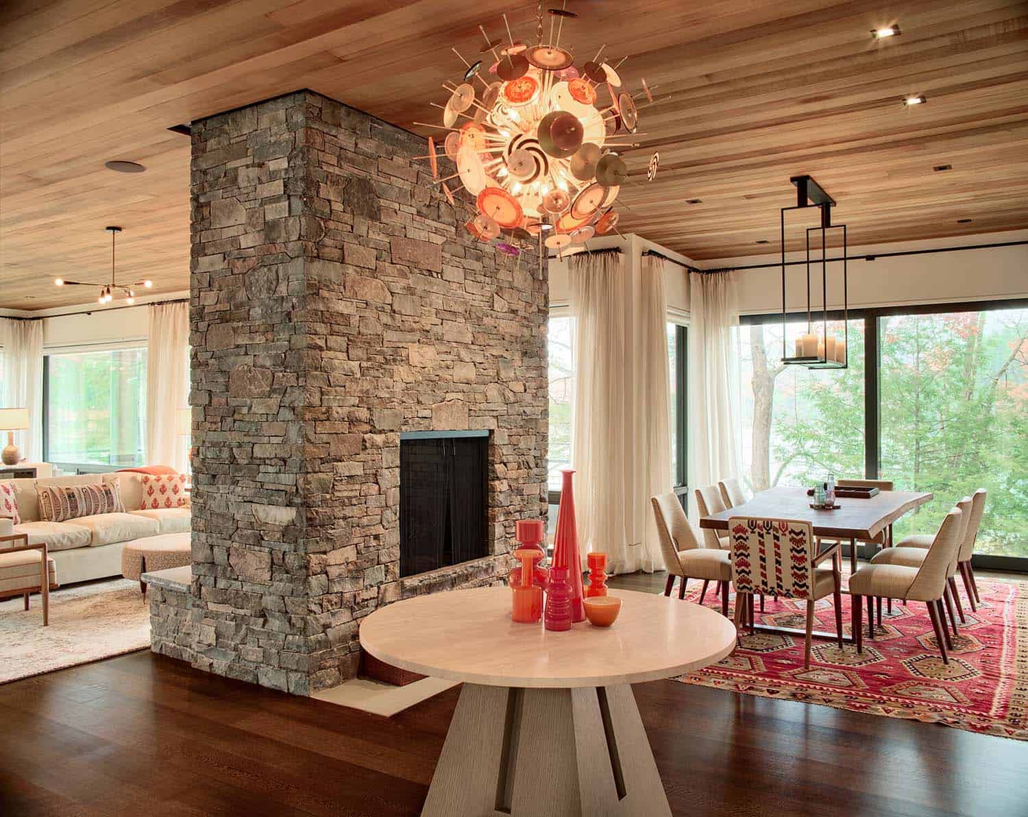 modern rustic dining room with a fireplace