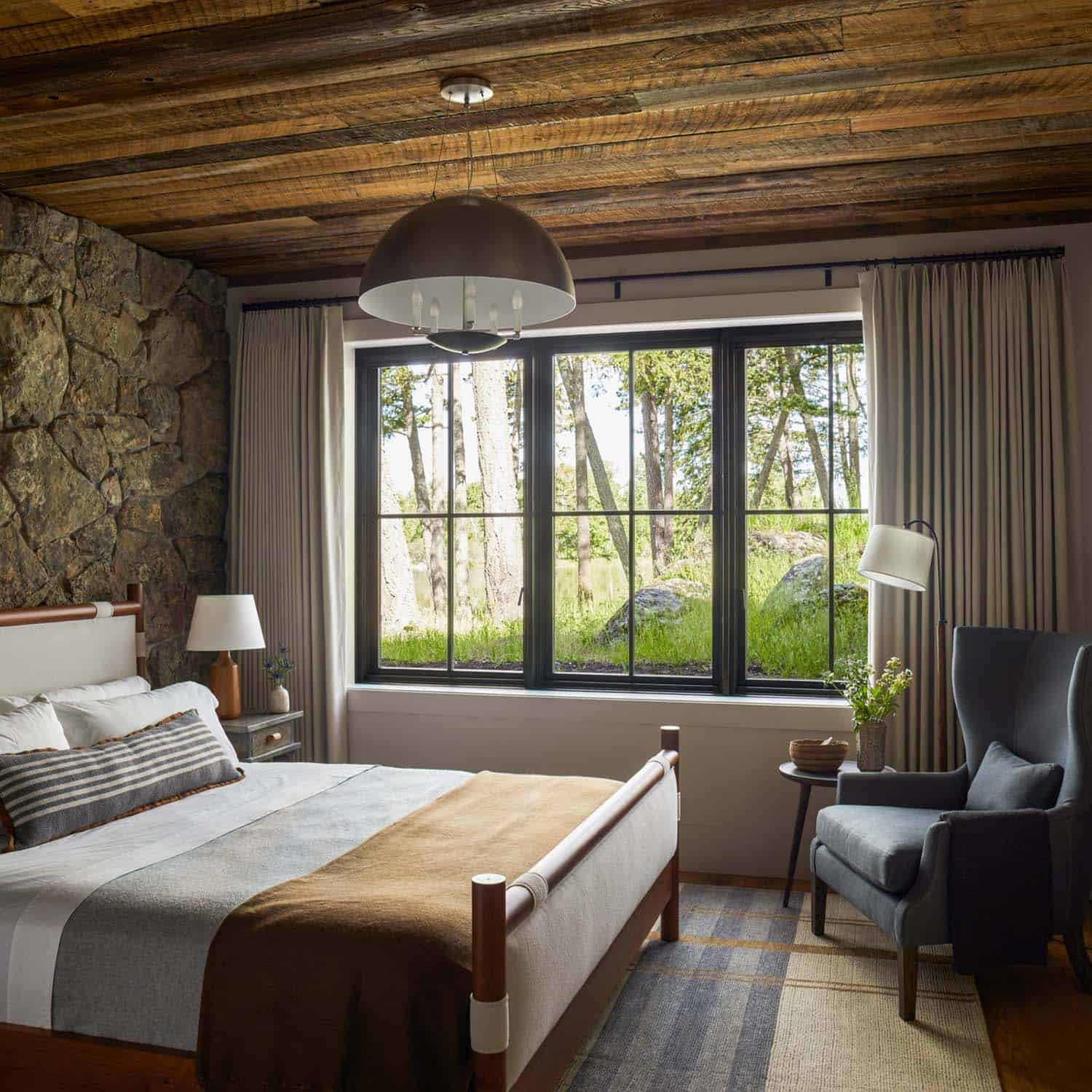 modern rustic bedroom with a wood ceiling
