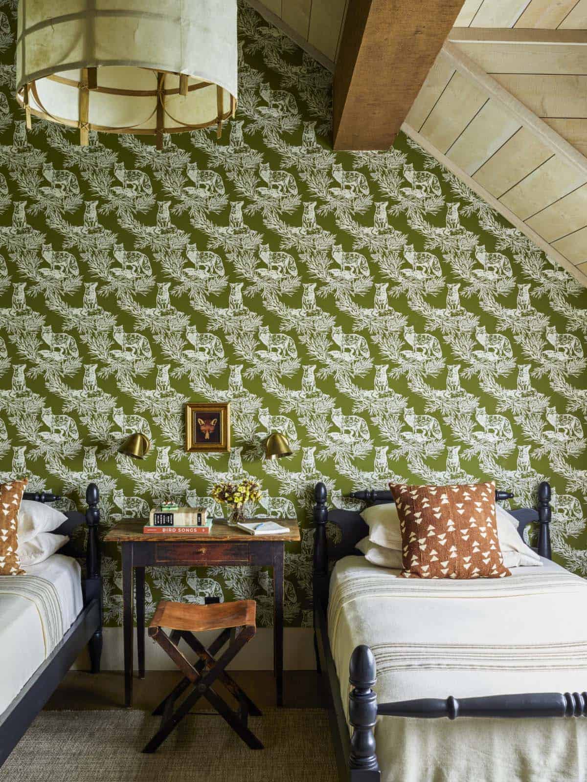 modern rustic bedroom with patterned green and white wallpaper