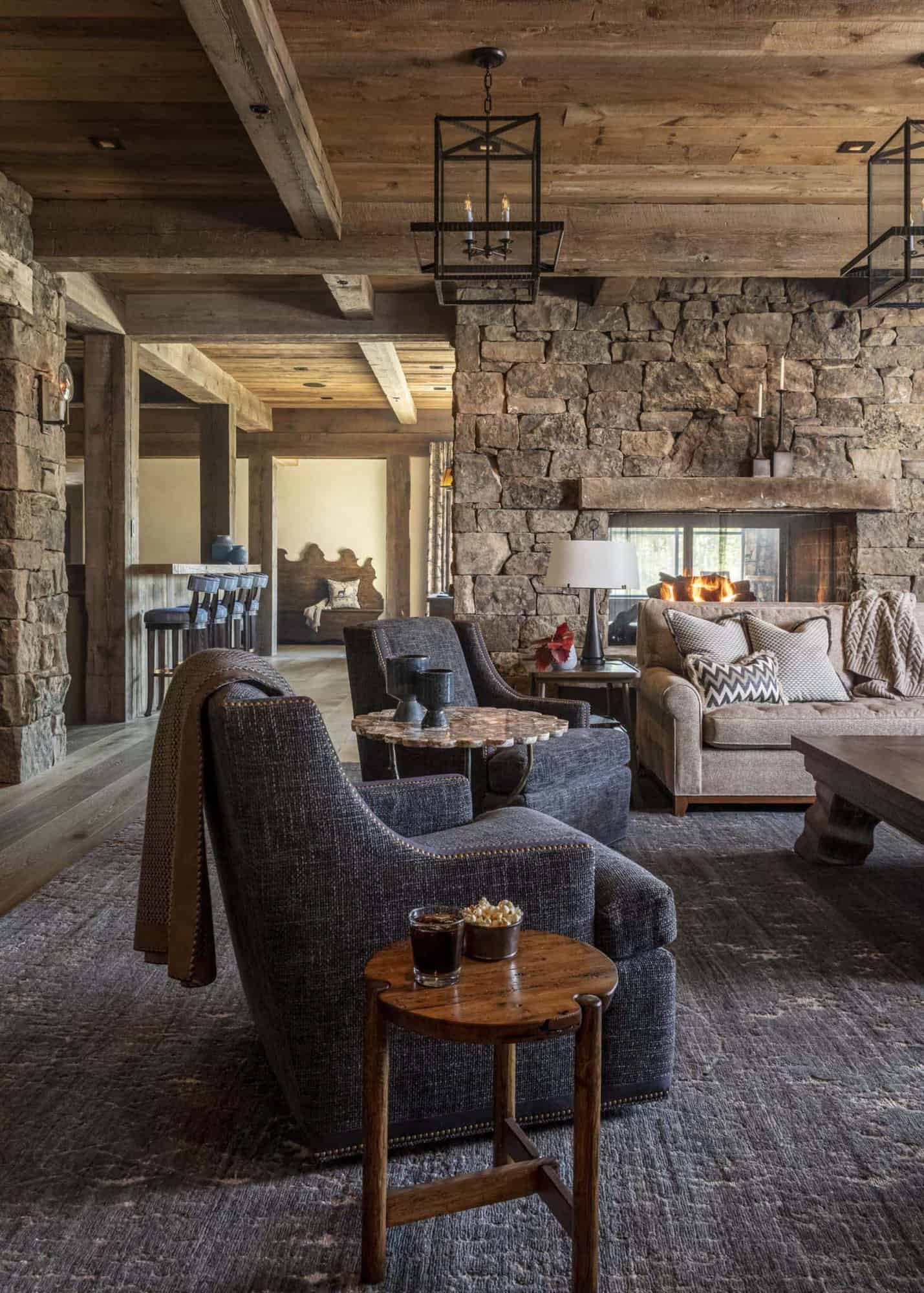 modern rustic family room with a dual sided fireplace