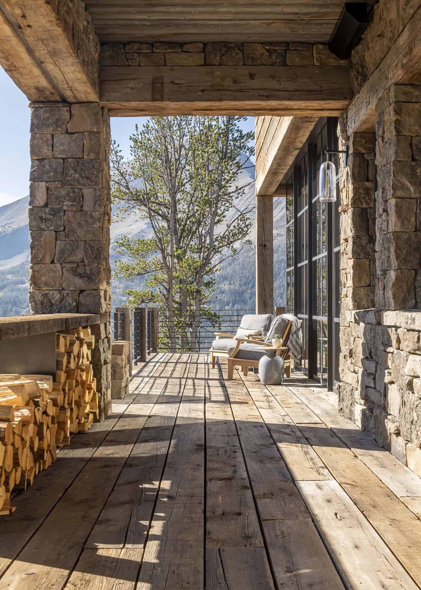 modern rustic mountain home covered deck with firewood storage