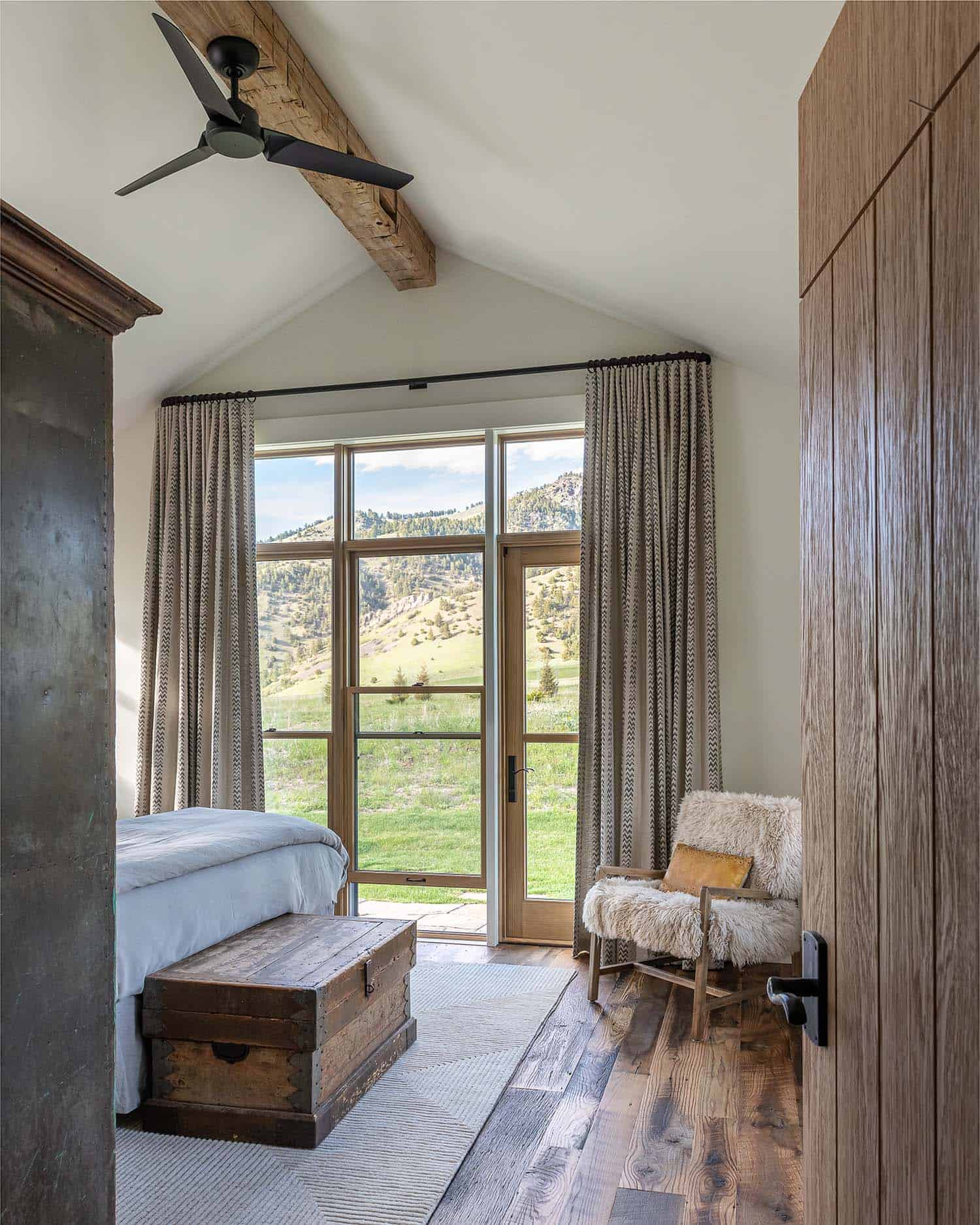 modern rustic bedroom with large windows