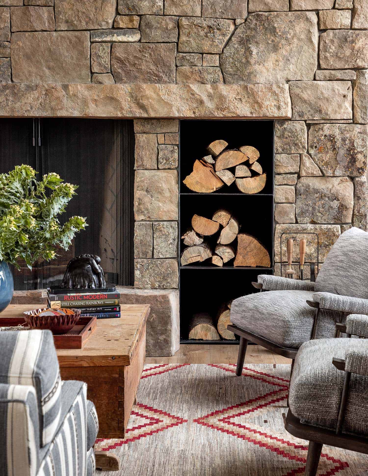 modern rustic living room with a fireplace and log storage