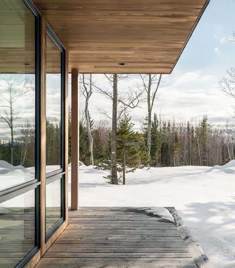 modern ski house exterior with snow