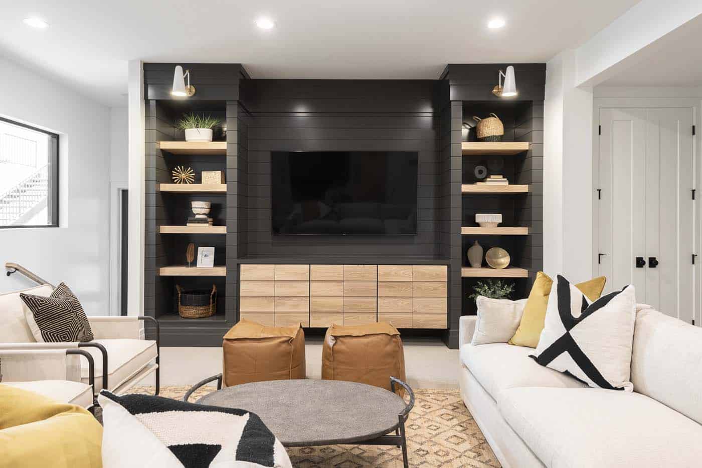 modern family room with a black accent wall