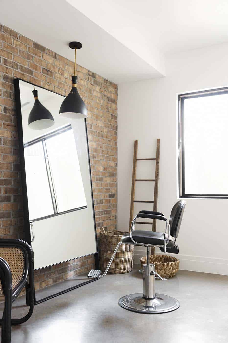 modern barber chair with a large mirror