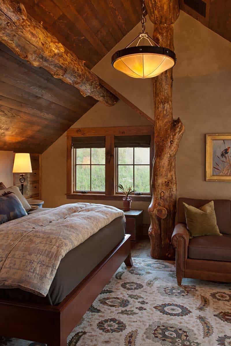 rustic bedroom with an angled ceiling