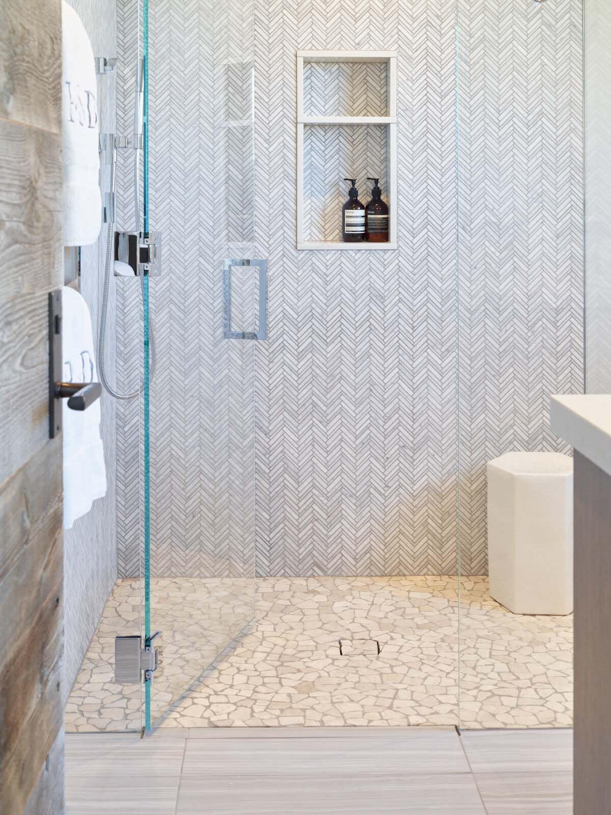 modern shower with white tiles