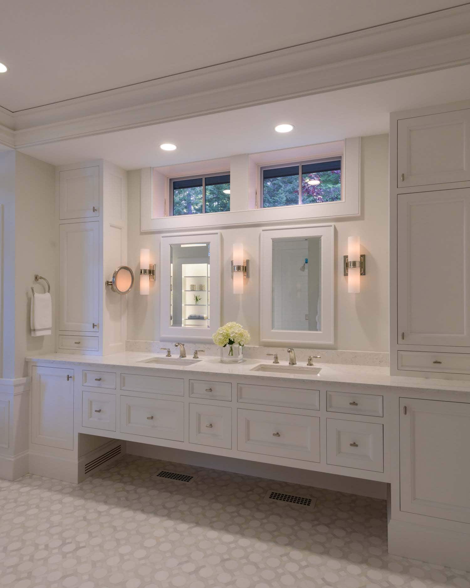 traditional bathroom with a large vanity and two sinks
