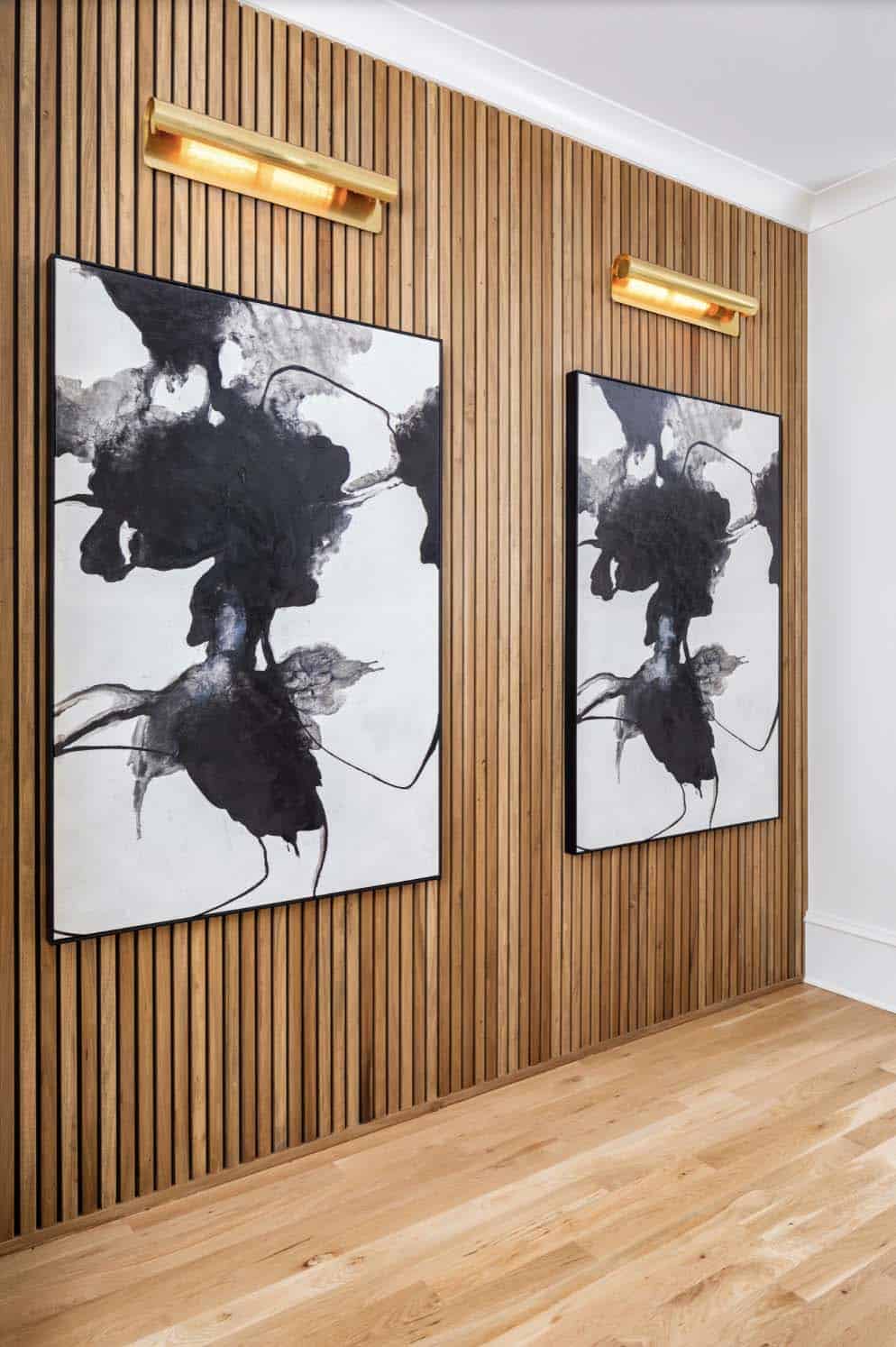 transitional style hallway with black and white art