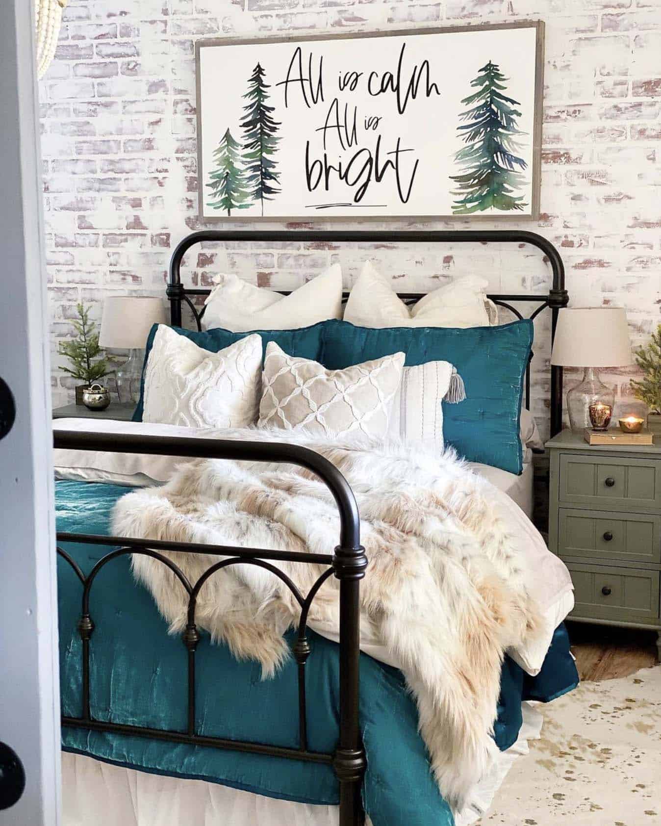 christmas decorated bedroom with teal and white and artwork