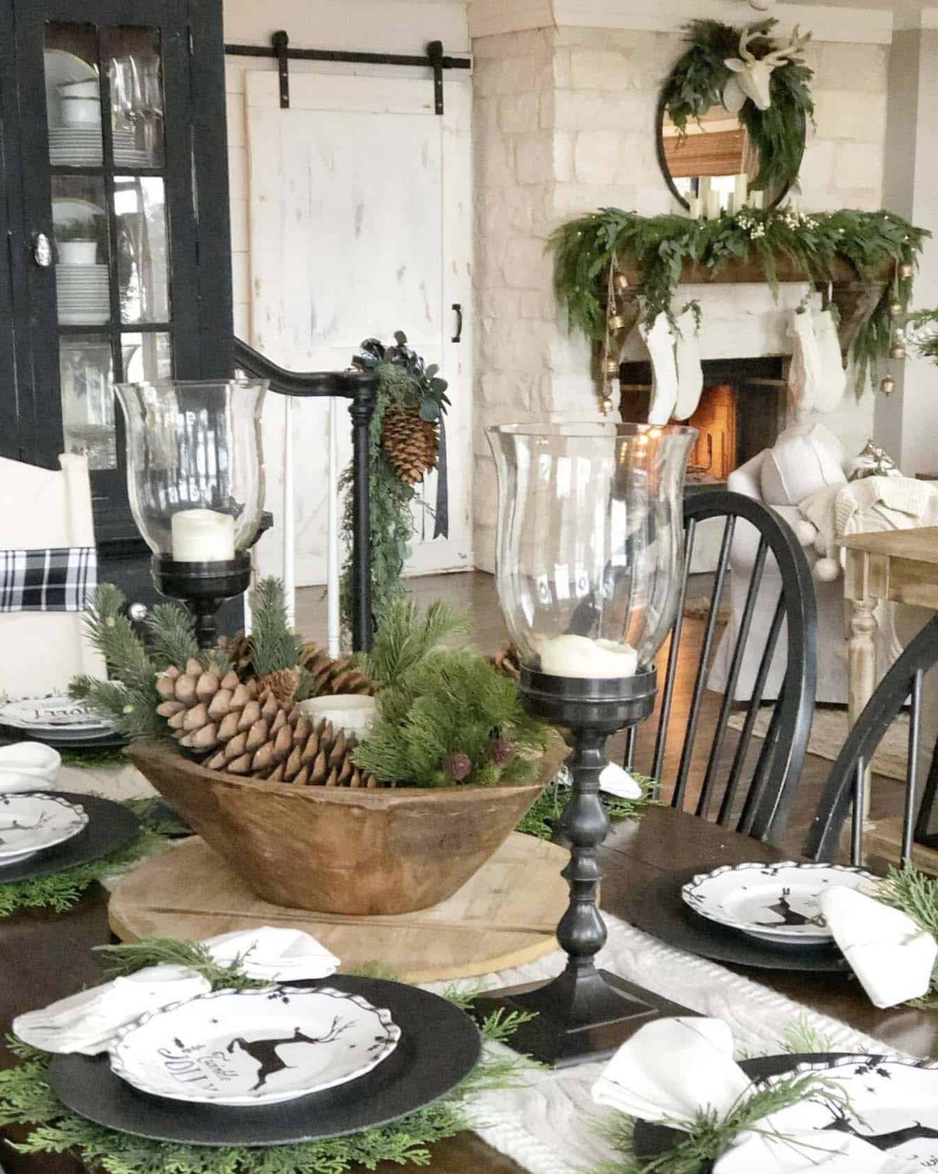 christmas decorated dining table with a green and black theme