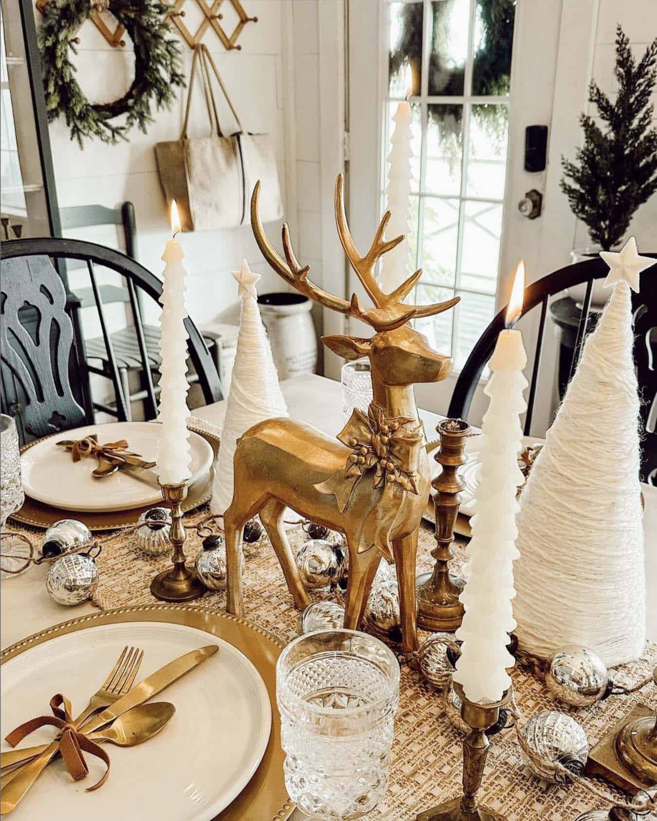 elegant silver and gold Christmas decorations on the dining table