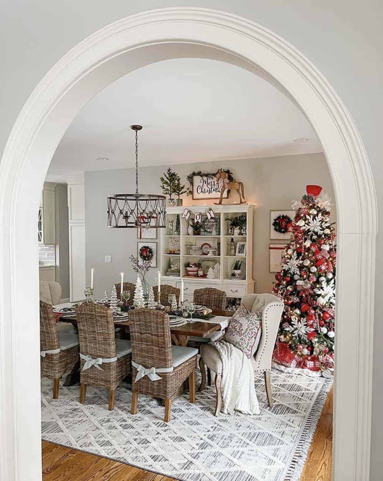 whimsical dining table with red and white Christmas decorations