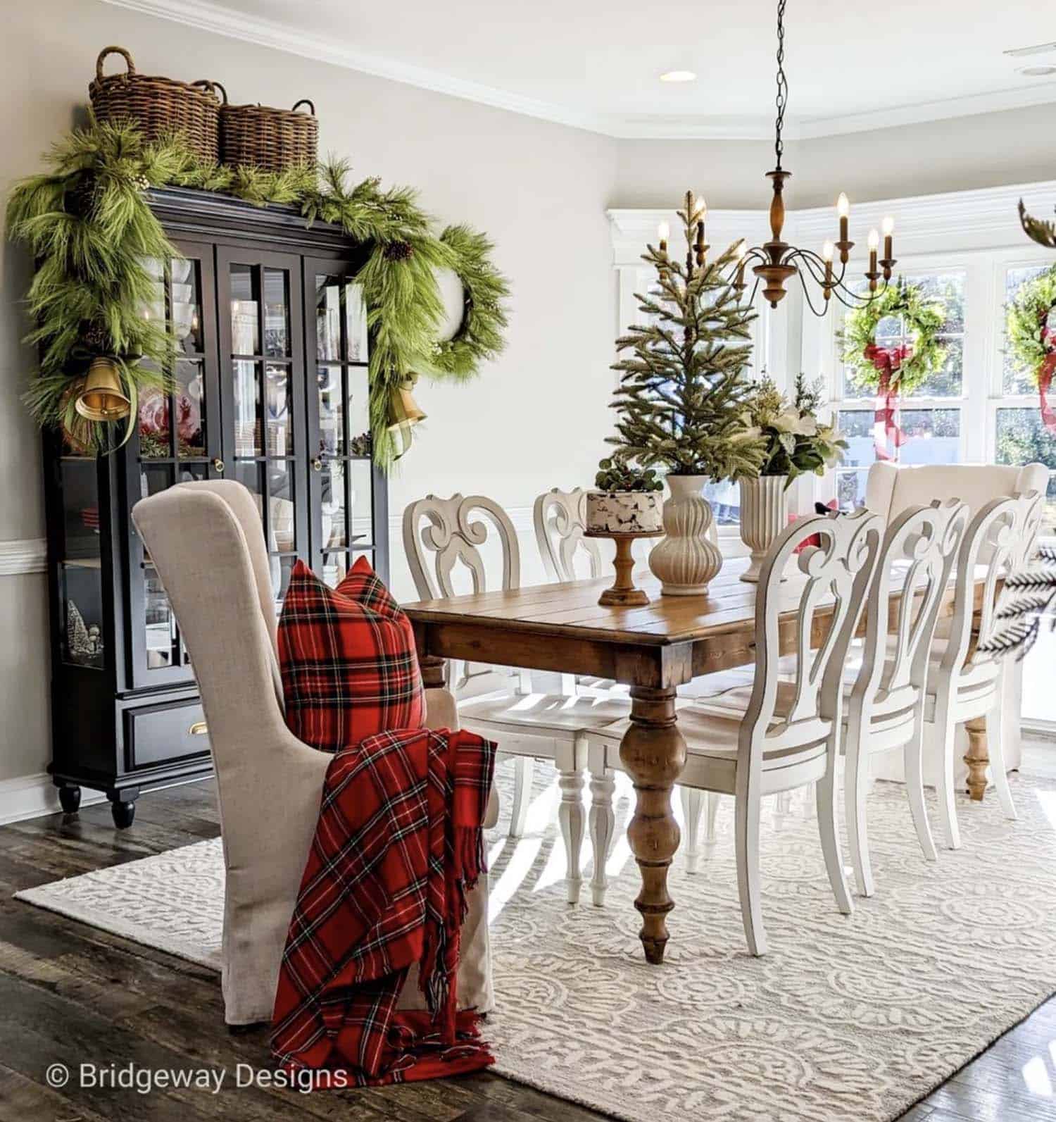Christmas decorated dining table with a small tree as the centerpiece