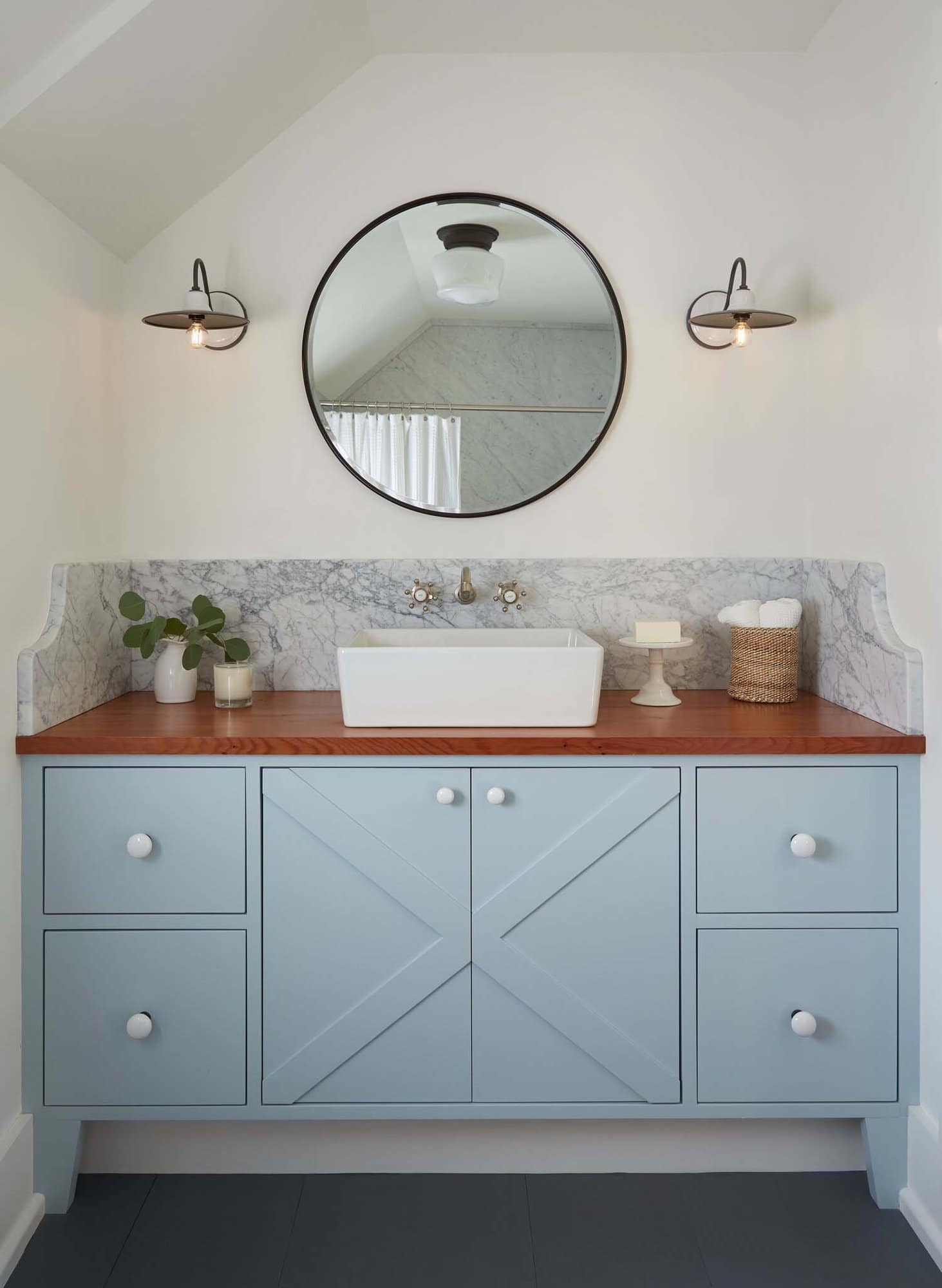 coastal farmhouse bathroom vanity with blue cabinets