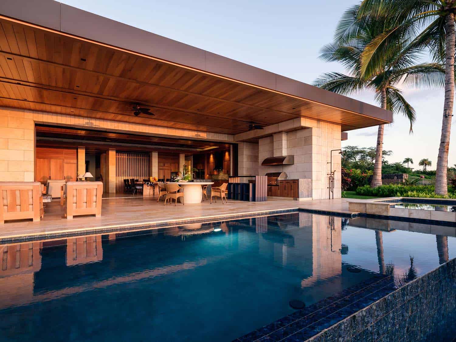 contemporary beach house with a backyard view of the pool