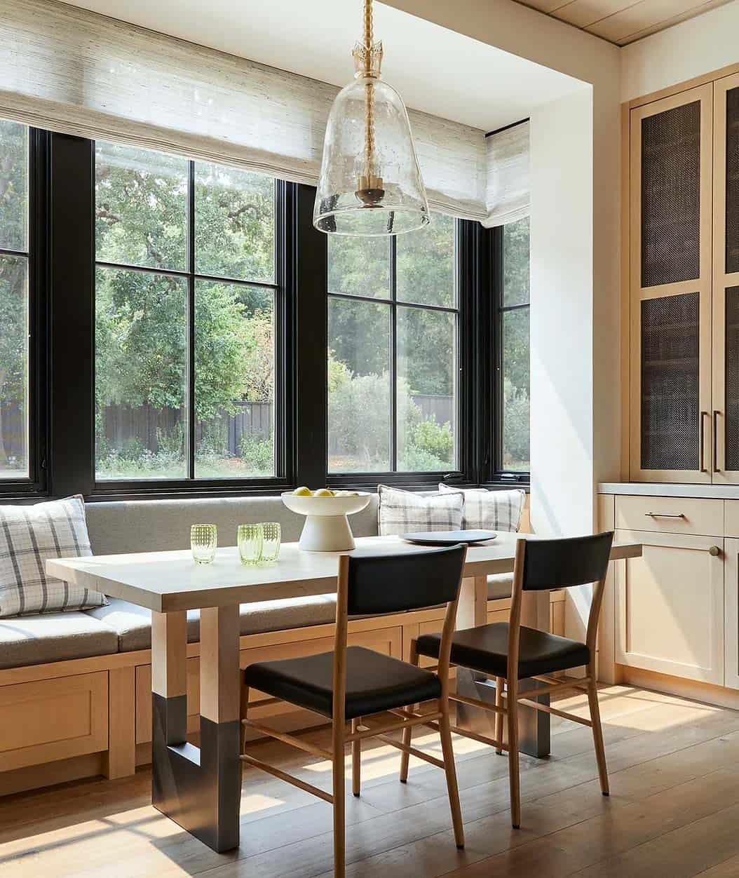 contemporary dining nook with a built-in window seat