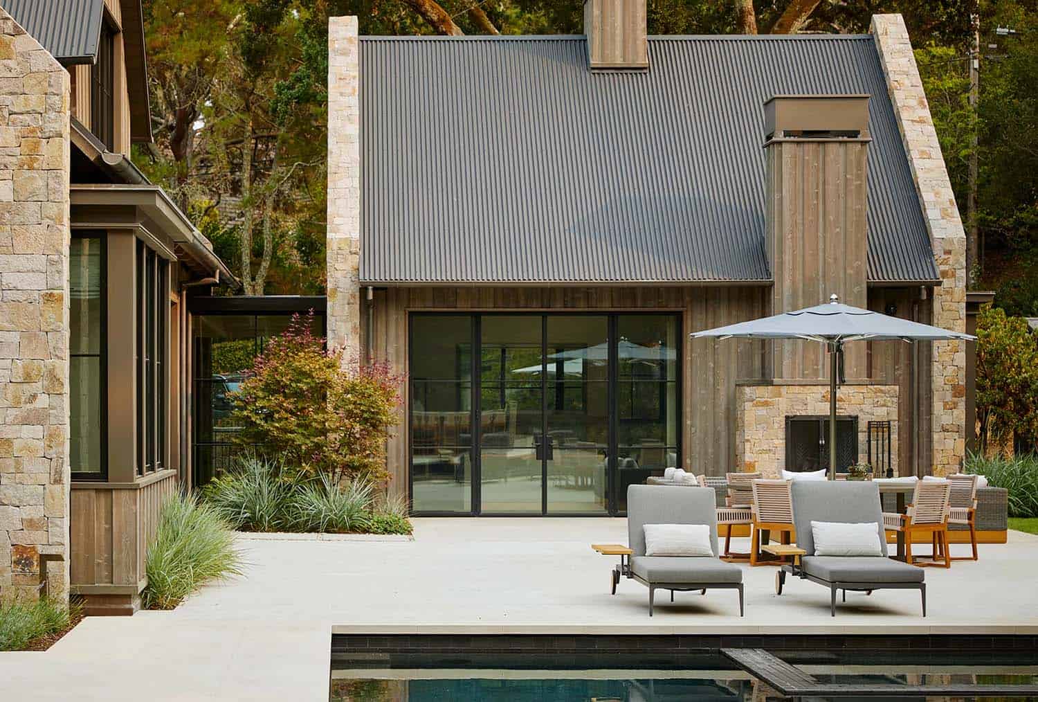 contemporary home exterior with a patio and swimming pool