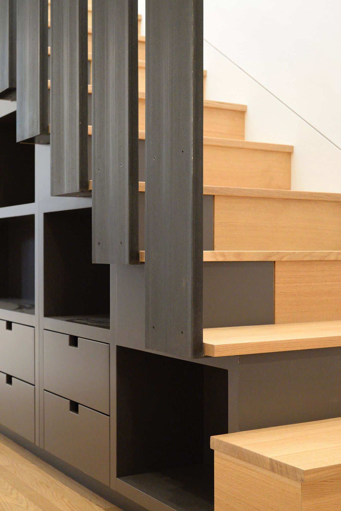 contemporary staircase with integrated storage 