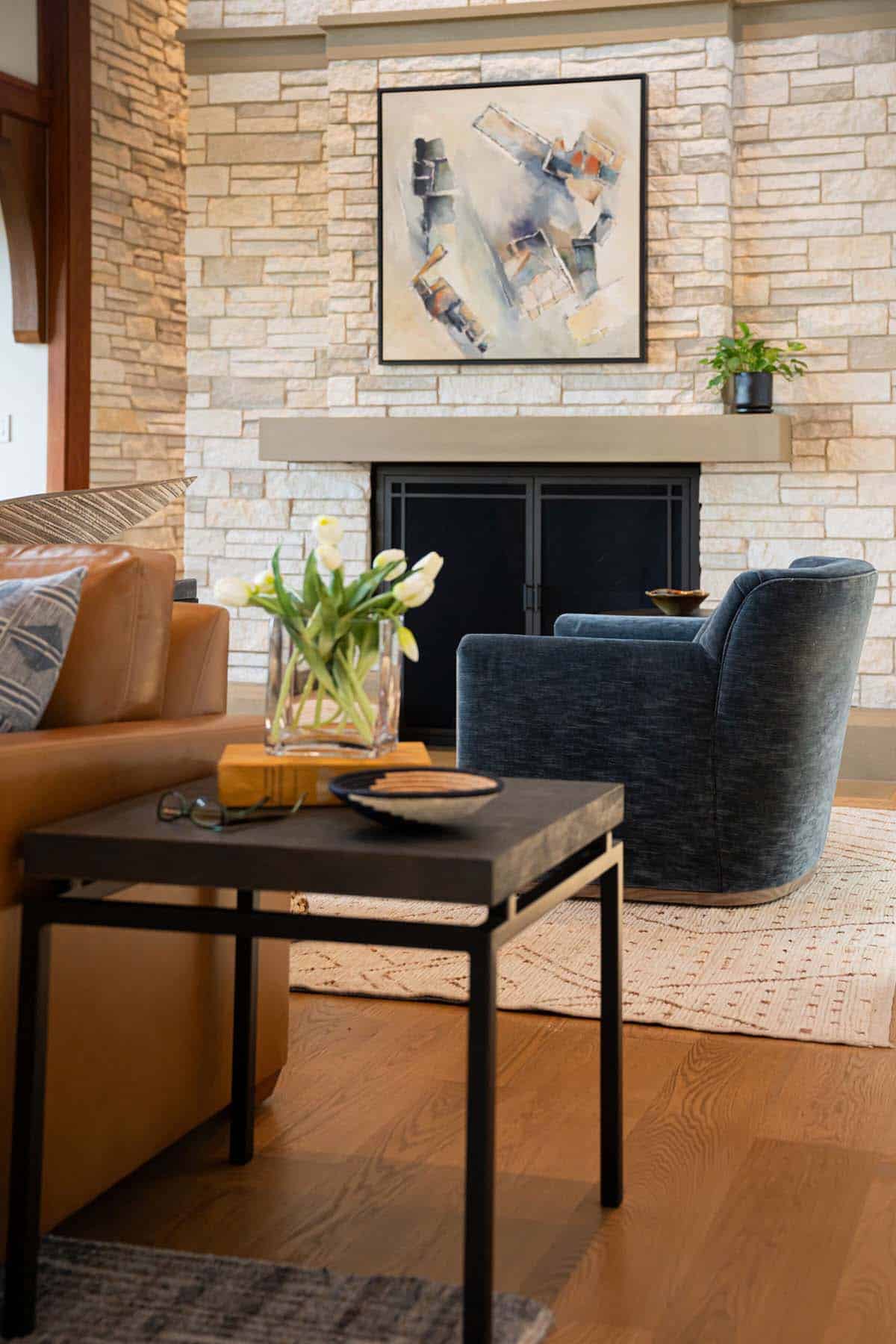 contemporary craftsman style living room with a fireplace